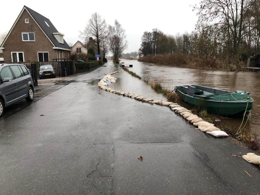 Illustratieve weergave van een overstroming na regenval